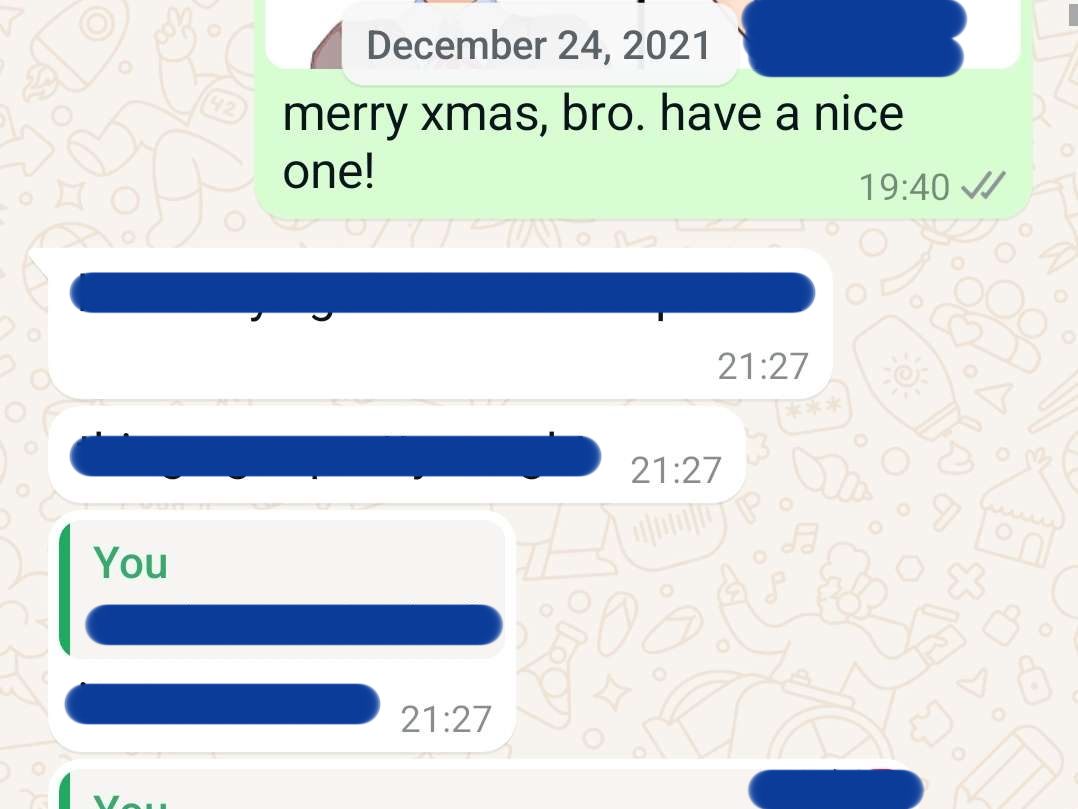 An image of conversation on WhatsApp, the sender saying 'merry xmas, bro. have a nice one!' and the rest is censored.